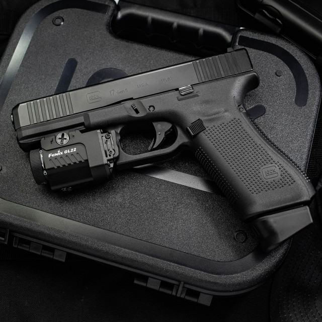 Fenix GL22 tactical light with red laser sight